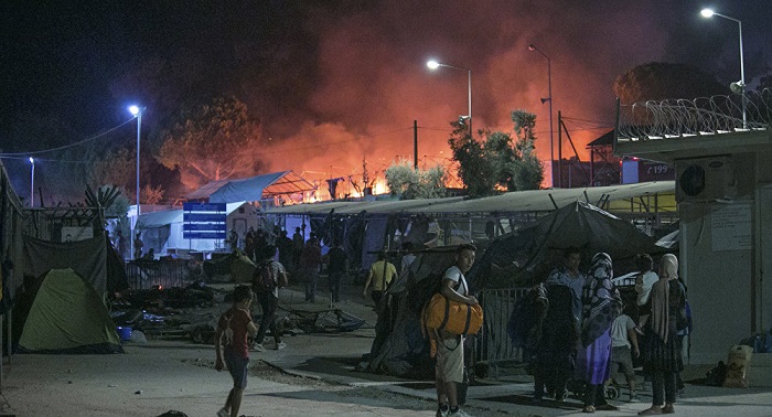 Migrants protest at Greek Lesbos Refugee camp, service offices set on fire